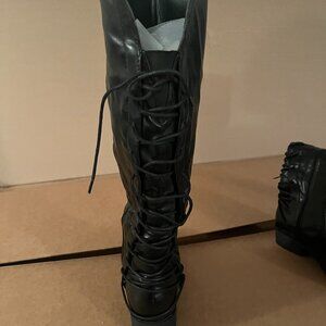 Tall black boots by Natural Reflections